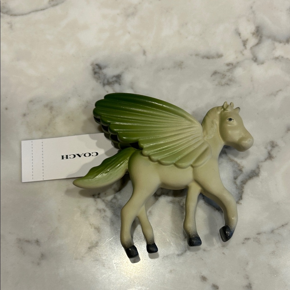 Coach pegasus shoe charm